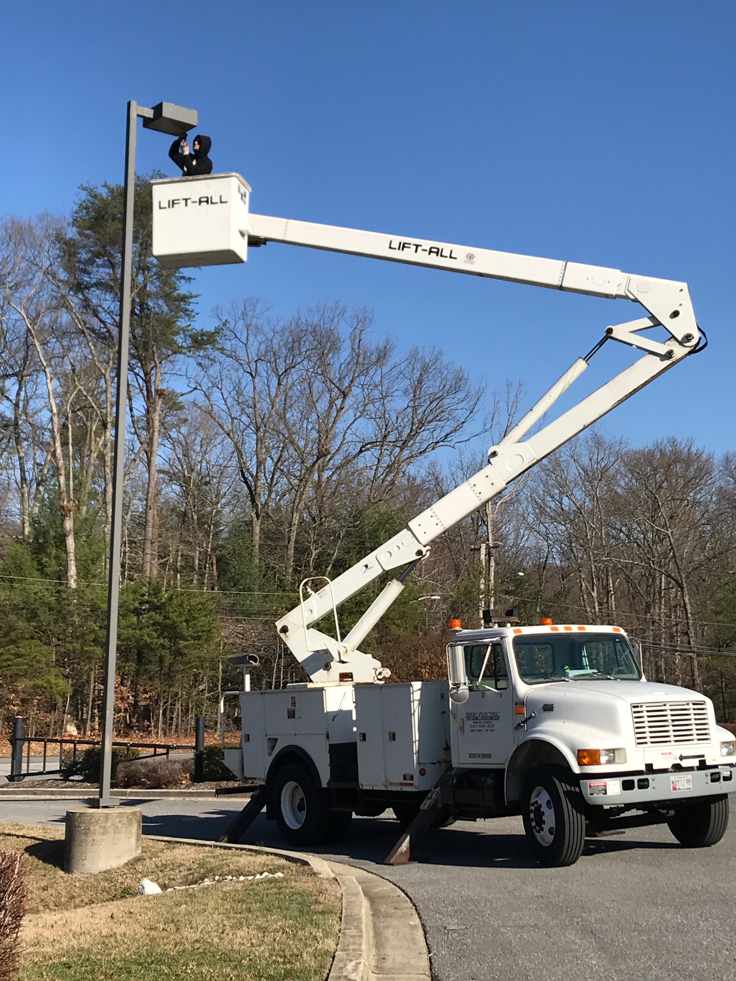 Pirro Electric bucket truck on a commercial job site