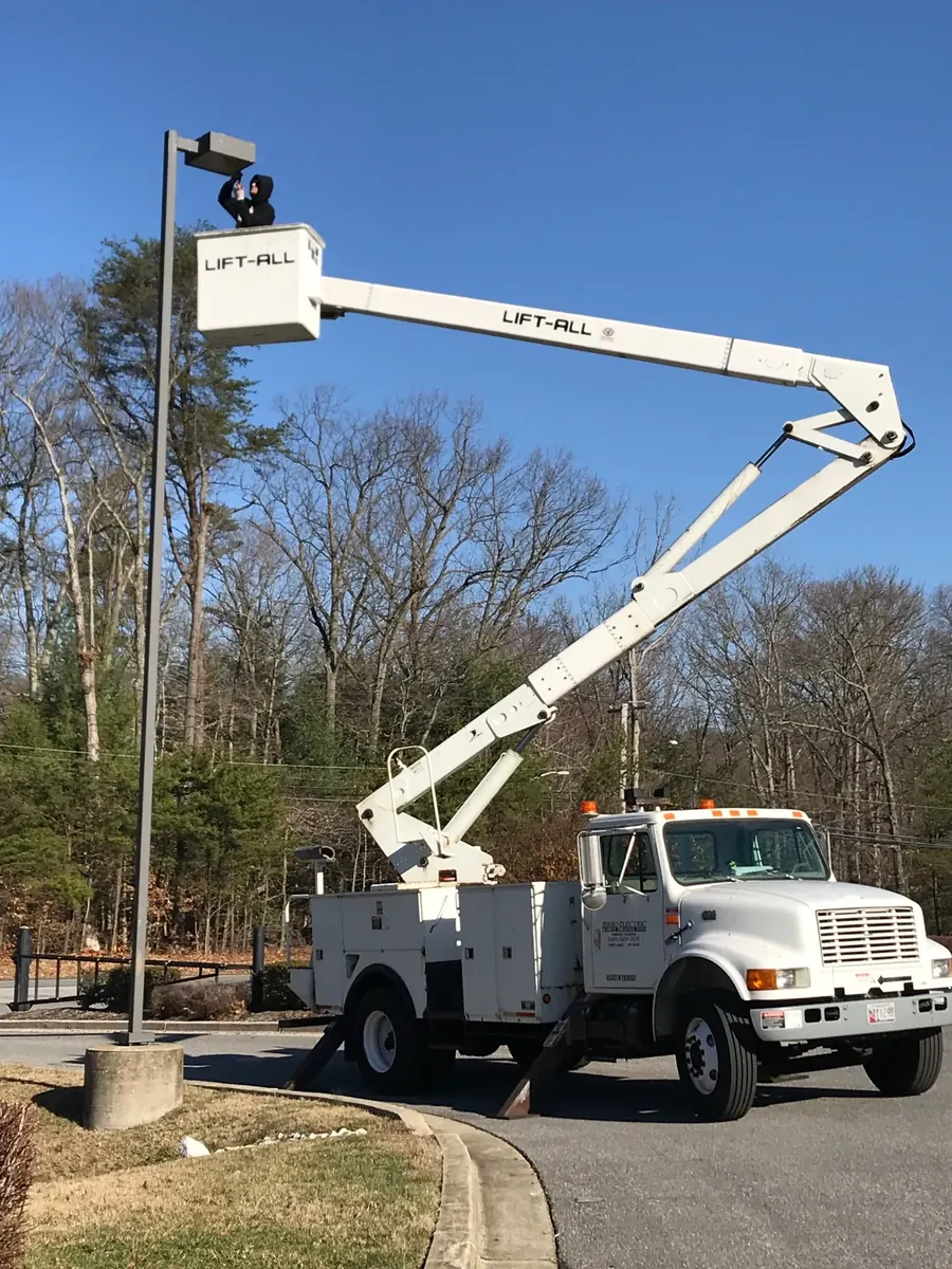 Pirro Electric bucket truck on a commercial job site