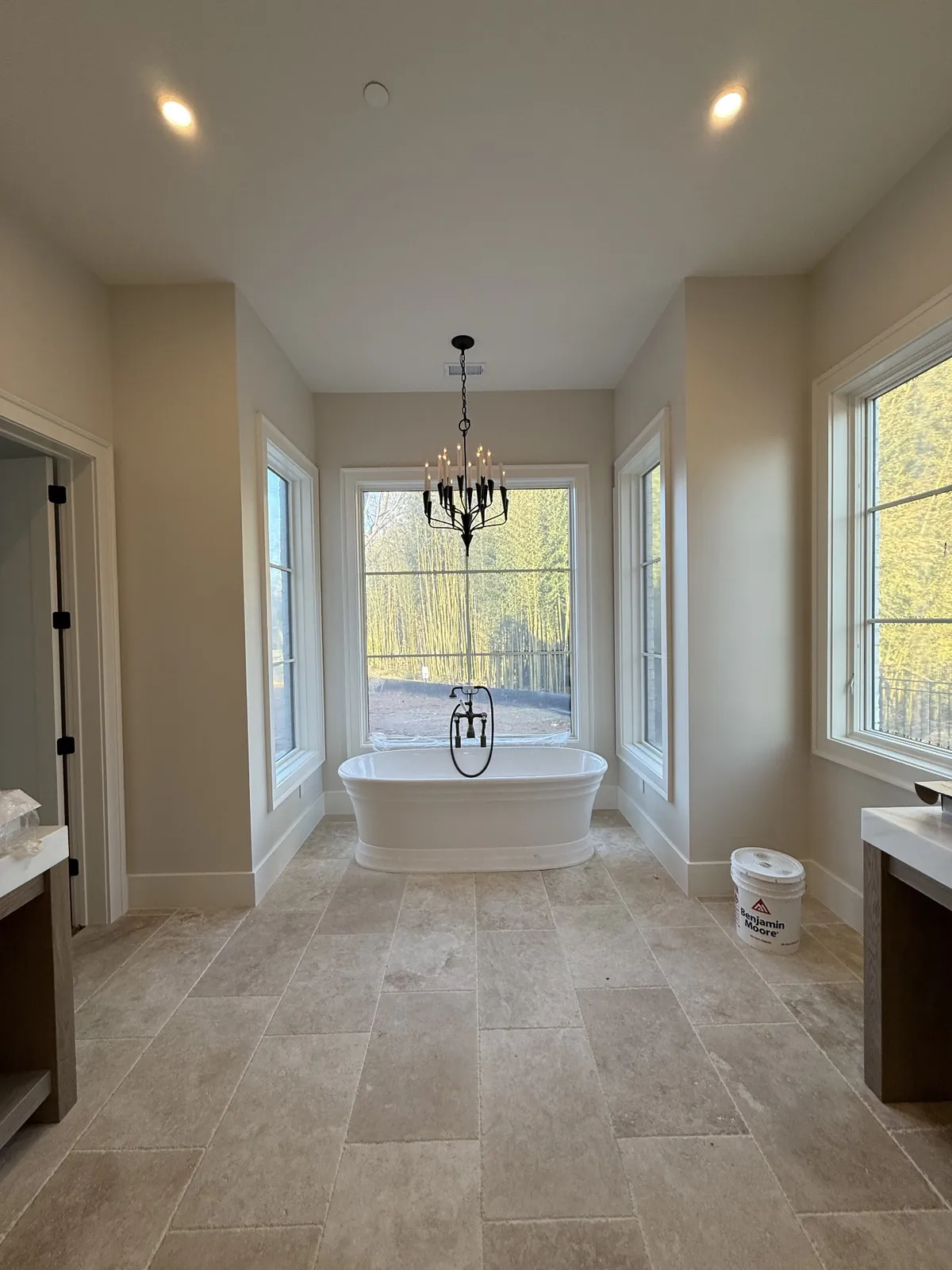 Bathroom chandelier and recessed lighting installation